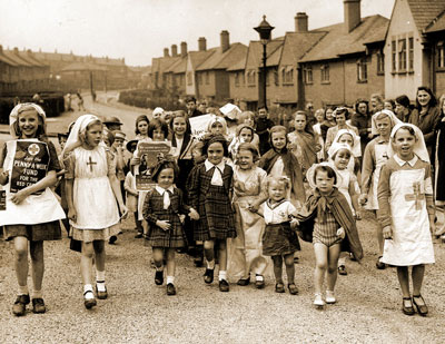 Children's fancy dress parade in Hibernia Street in support of the Red Cross